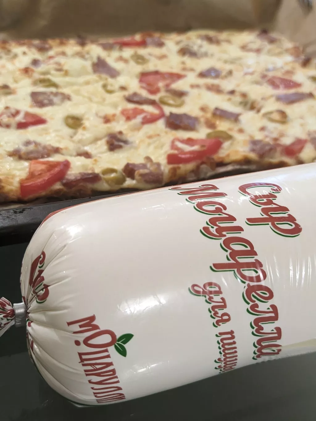 фотография продукта Моцарелла для пиццы м.д.ж.45