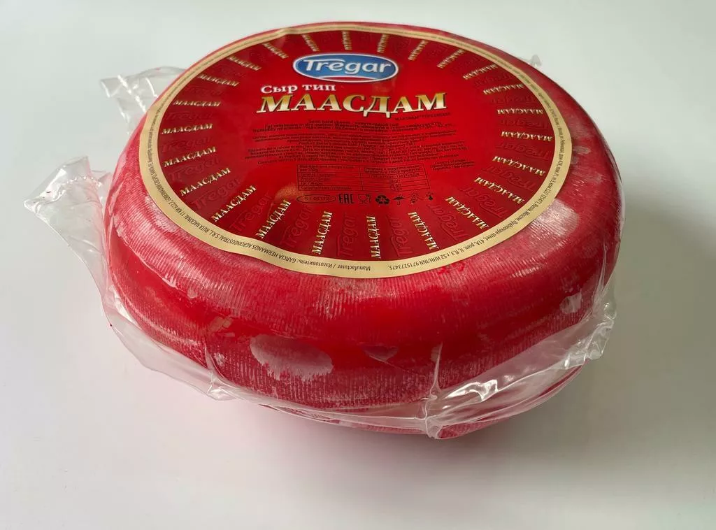фотография продукта Сыр твердый maasdam, мдж 41%, головка